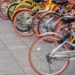 Shanghai: Rows of bikes are placed in the white lines painted on the road in Shanghai. The disorder of parking becomes a social problem according the increase of share bikes.